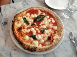 The margherita pizza is a popular choice on the menu. It includes fresh mozzarella, parmesan, basil and olive oil. Photo by Jessica Rolnick
