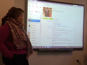 Madame Kabamba discusses the goal of the Skype call with students prior to calling in.  Photo by Bianca Corgan.