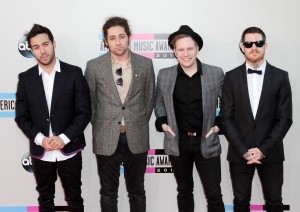 Pete Wentz, left, and Fall Out Boy arrive at the 2013 American Music Awards at the Nokia Theatre L.A. Live in Los Angeles on Sunday, November 24, 2013. (Adam Orchon/Sipa USA/MCT)