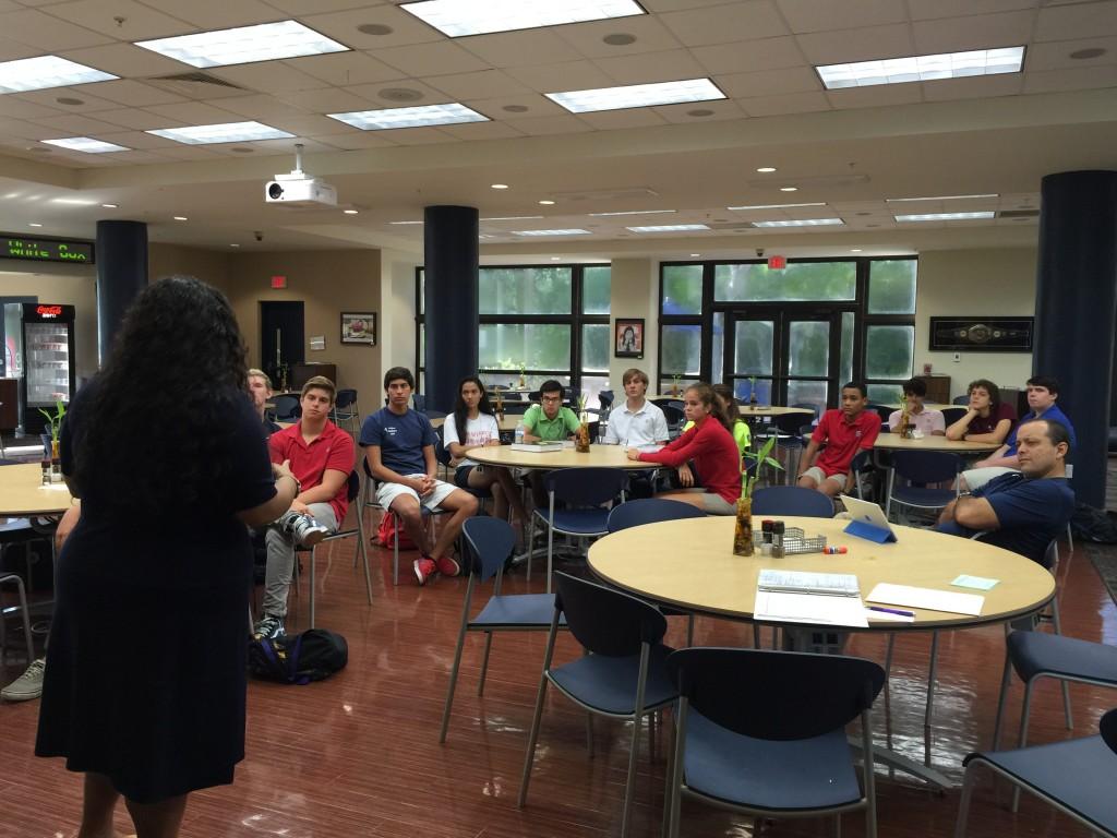 Students attend a college visit from MIT in the student union.