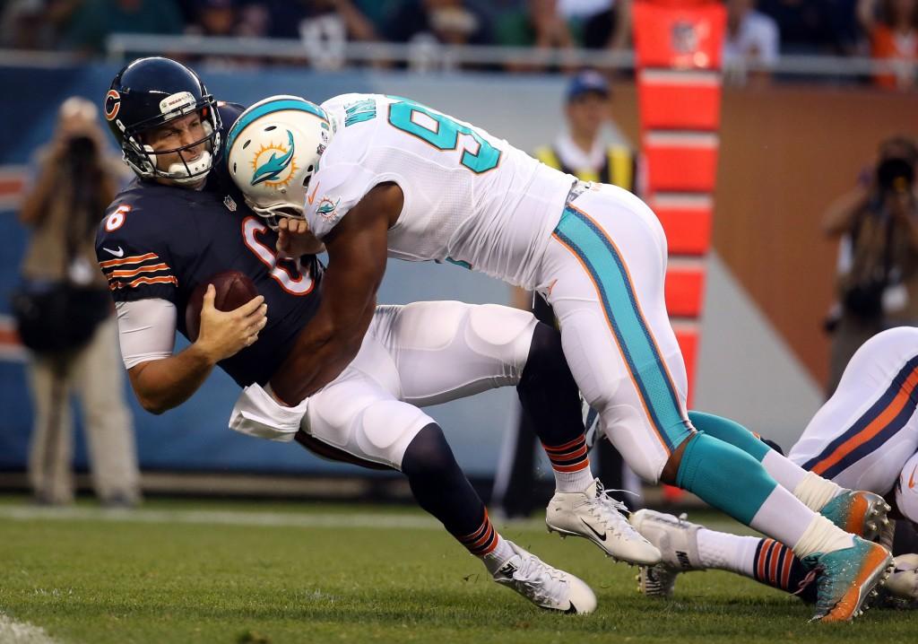 Miami Dolphins defensive end Cameron Wake (91) sacks Chicago Bears quarterback Jay Cutler, overturned on a penalty, in the second quarter on Thursday, Aug. 13, 2015 at Soldier Field in Chicago. (Brian Cassella/Chicago Tribune/TNS)