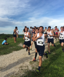 Several cross country run- ners, finish the latter part of the race. The runners include juniors Ryan Pino.