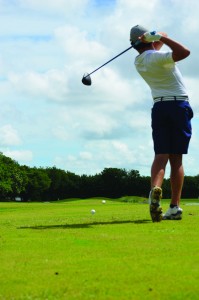 Sophomore Roman Lopez watches his ball after crushing it off the tee. Photo by Coach Piggot.