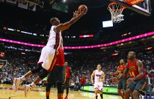 Miami Heat's Chris Bosh goes to the basket to score two points during the fourth quarter on Sunday, Jan. 31, 2016, at AmericanAirlines Arena in Miami. (Hector Gabino/El Nuevo Herald/TNS)