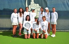 The girls’ tennis team poses for a photo. The team’s top performers are seniors  Julieta Dalmau and Estefania Navarro, along with and junior Lindy Lyons. 
