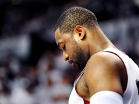 The Miami Heat's Dwyane Wade hangs his head late in the second quarter as the San Antonio Spurs build a lead in Game 4 of the NBA Finals at American Airlines Arena in Miami on Thursday, June 12, 2014. (Robert Duyos/Sun Sentinel/MCT)