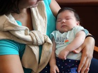 Maria Ramirez Bolivar, a Venezuelan woman who lives in Doral but contracted Zika in her first trimester while traveling in Venezuela, holds her baby girl, Micaela Milagros Mendoza, 2-months, on Aug. 24, 2016. Micalea has Zika-related calcification in her brain and scarring in her retinas. (Emily Michot/Miami Herald/TNS)