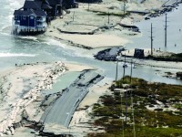 A section of Highway 12 at the edge of Rodanthe, North Carolina, was destroyed by Hurricane Irene in 2011. Such damage is expected to become more common as sea levels rise. (Chris Seward/Raleigh News & Observer/TNS)