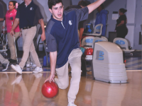 Senior Matthew Kirsner bowls in a game against Coral Park. Kirsner was one of the leading bowlers in the win. Photo by FoxMar.