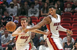 Miami Heat Goran Dragic and Hassan Whiteside chase a loose ball in the second quarter against the Boston Celtics on Monday, Nov. 28, 2016 at the AmericanAirlines Arena in Miami, Fla. (Charles Trainor Jr./Miami Herald/TNS)